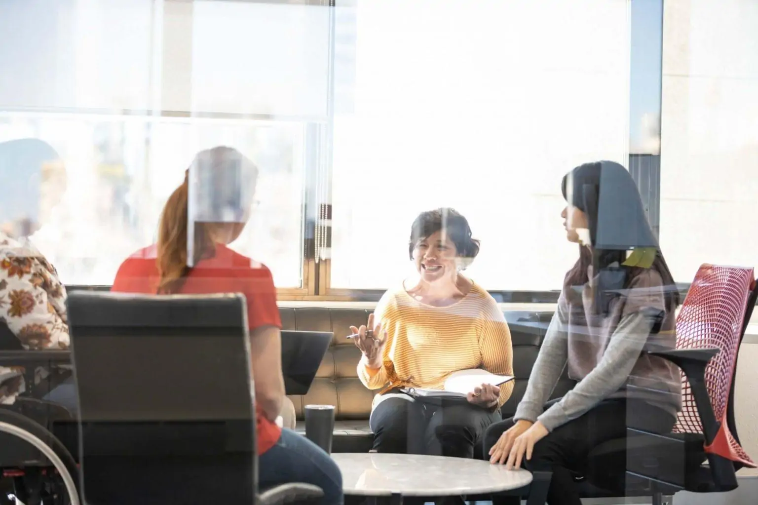 People talking together around a table